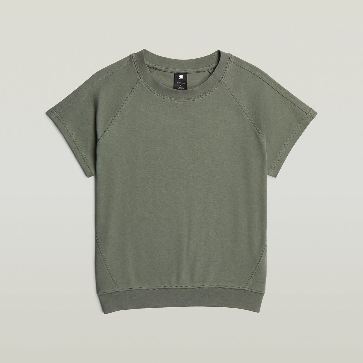 Raglan r t wmn green | Bildmaterial bereitgestellt von SHOES.PLEASE.